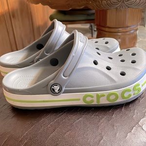 Crocs,size 9, gray with green around them